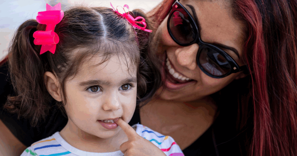 Happy mom and daughter enjoying a kids-friendly dining experience at Hash House A Go Go at The LINQ in Las Vegas.